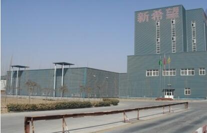 养猪巨头扩张要放缓？新希望明年目标大砍30%